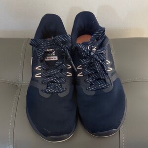 Nike Woman’s Navy and Light Pink Athletic Training Shoes